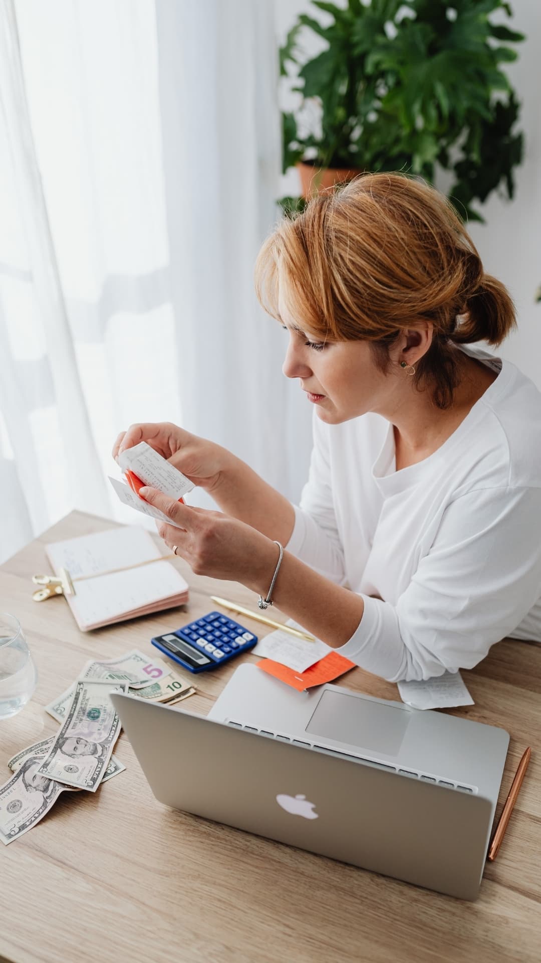 Calculator and financial documents for budgeting